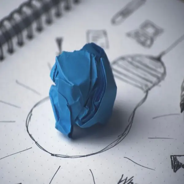 Sketch of a light bulb with crumpled paper